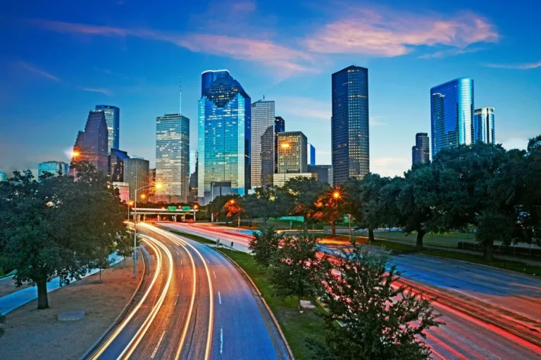 The downtown Houston business district skyline illuminated at dusk