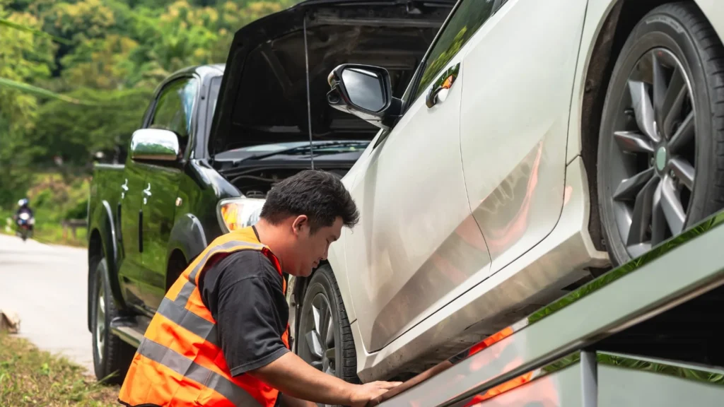 Older damaged vehicle awaiting professional pickup