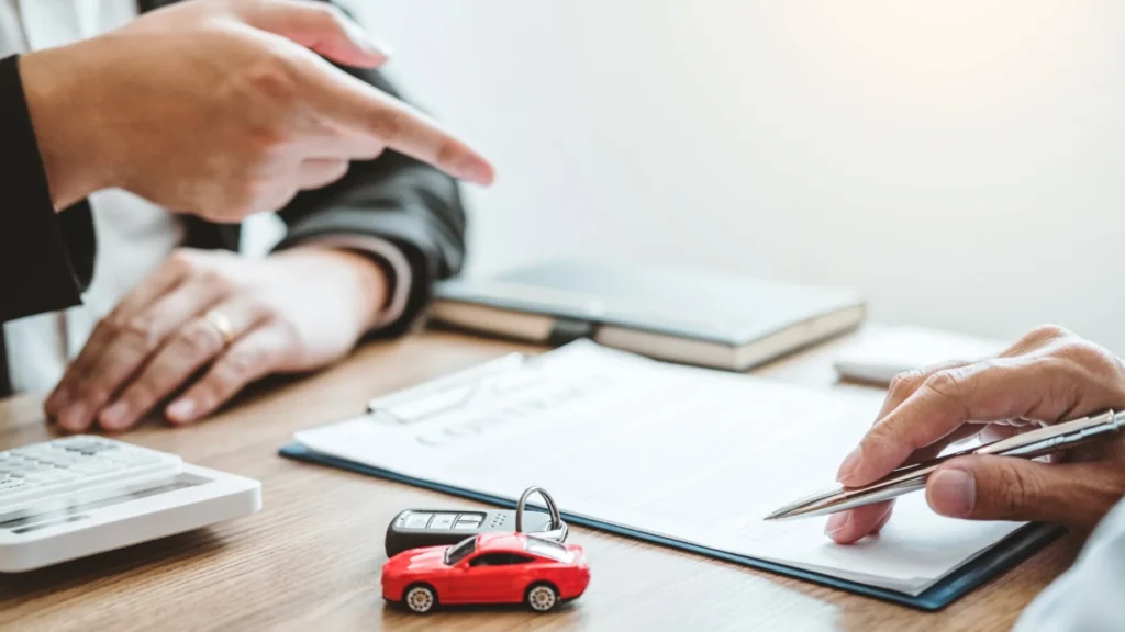 Damaged vehicle awaiting pickup in Illinois — Can You Sell a Junk Car With a Lien in Illinois?