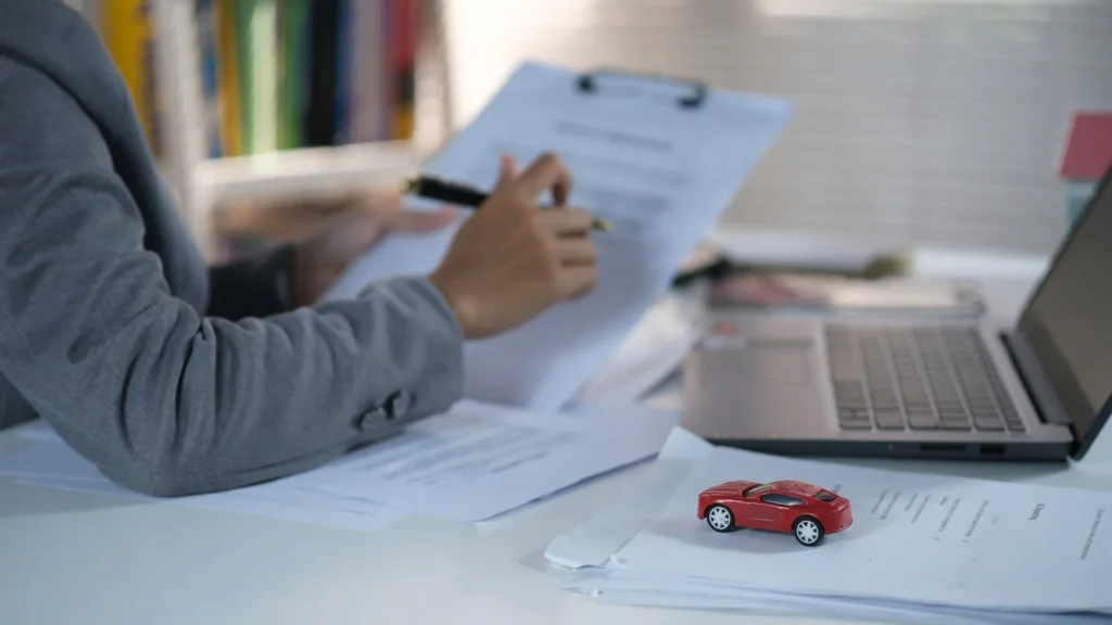 Damaged vehicle awaiting pickup in Illinois — Can You Sell a Junk Car Without a Title in Illinois?