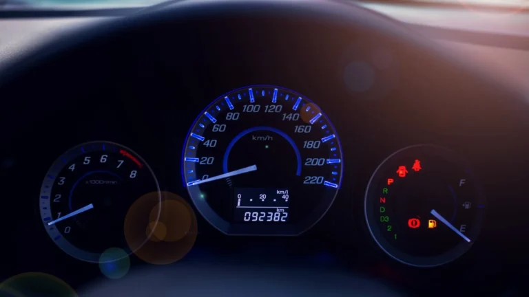 Vehicle dashboard with an odometer and mileage display