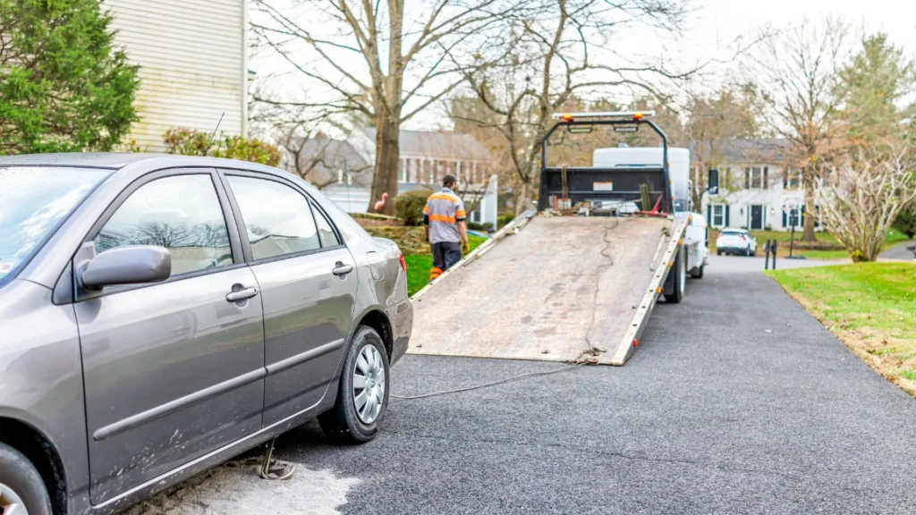 Older damaged vehicle awaiting professional pickup