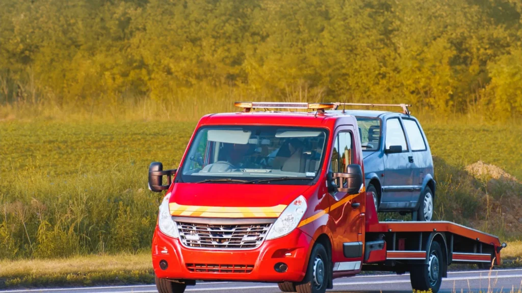 Older damaged car awaiting a tow in a rural Nevada setting