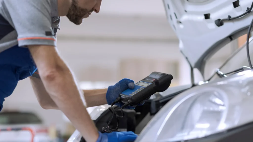 Damaged vehicle awaiting pickup in Illinois — What to Do After a Failed Emissions Test in Illinois