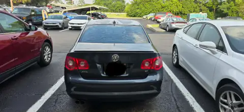 Black 2005 Volkswagen Jetta viewed from the rear after purchase by CashSellCar in Ohio