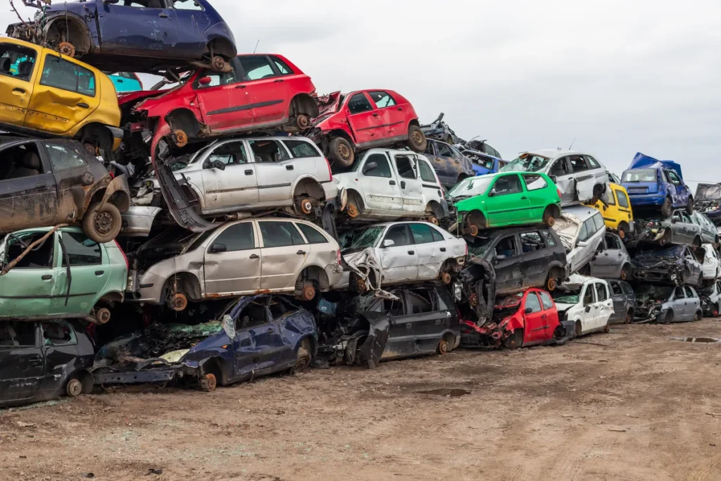 Wrecked junk cars stacked for scrap in a Pennsylvania yard