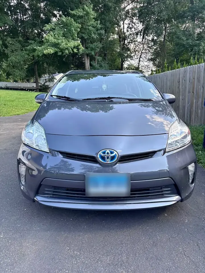 2014 Toyota Prius Plug-in Hybrid bought from a Connecticut seller for $7,000 by CashSellCar, which buys junk cars in CT