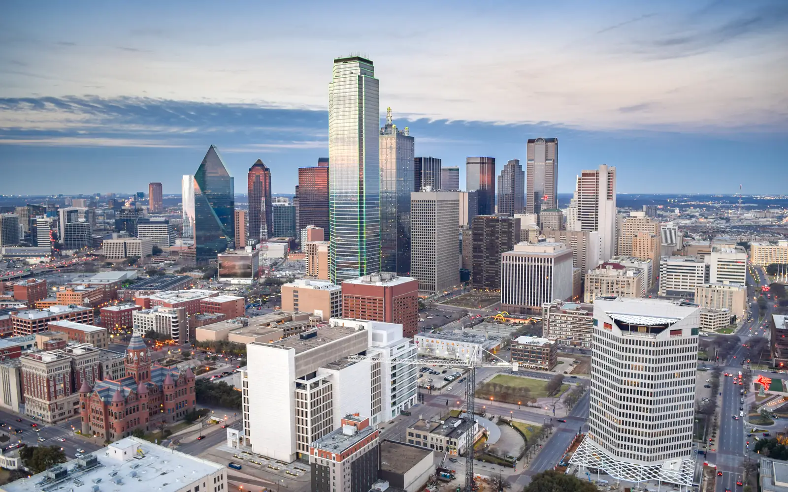 Dallas, Texas | Cash for Cars in Texas Aerial view of downtown Dallas on a summer evening, Texas