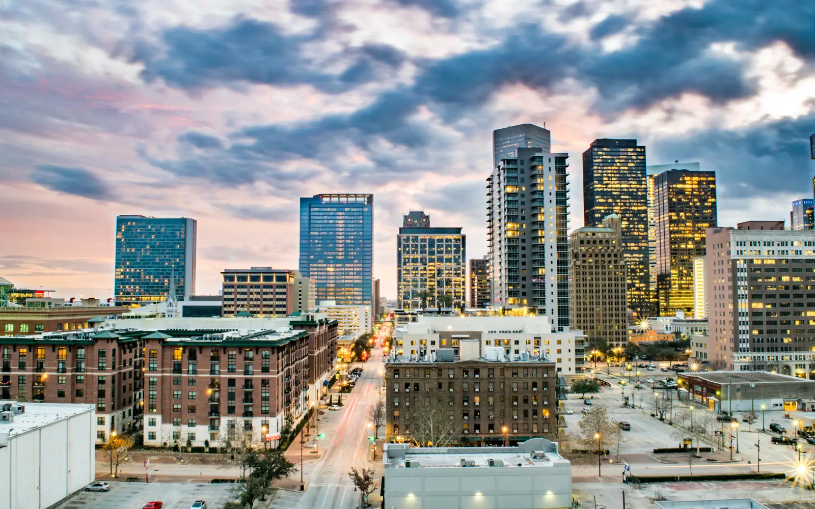 Houston, Texas | Cash for Cars in Texas Downtown Houston skyline at dusk, Texas
