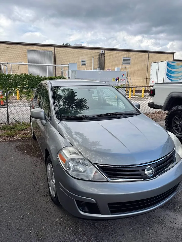 2011 Nissan Versa SL Hatchback bought from a seller in Jacksonville, Florida for $660 by CashSellCar